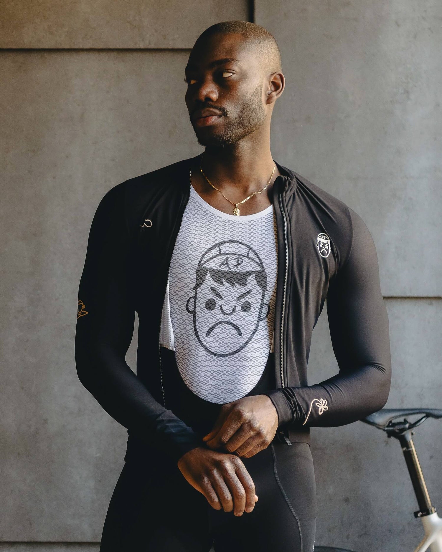 A cyclist wearing an Angry Pablo cycling base layer