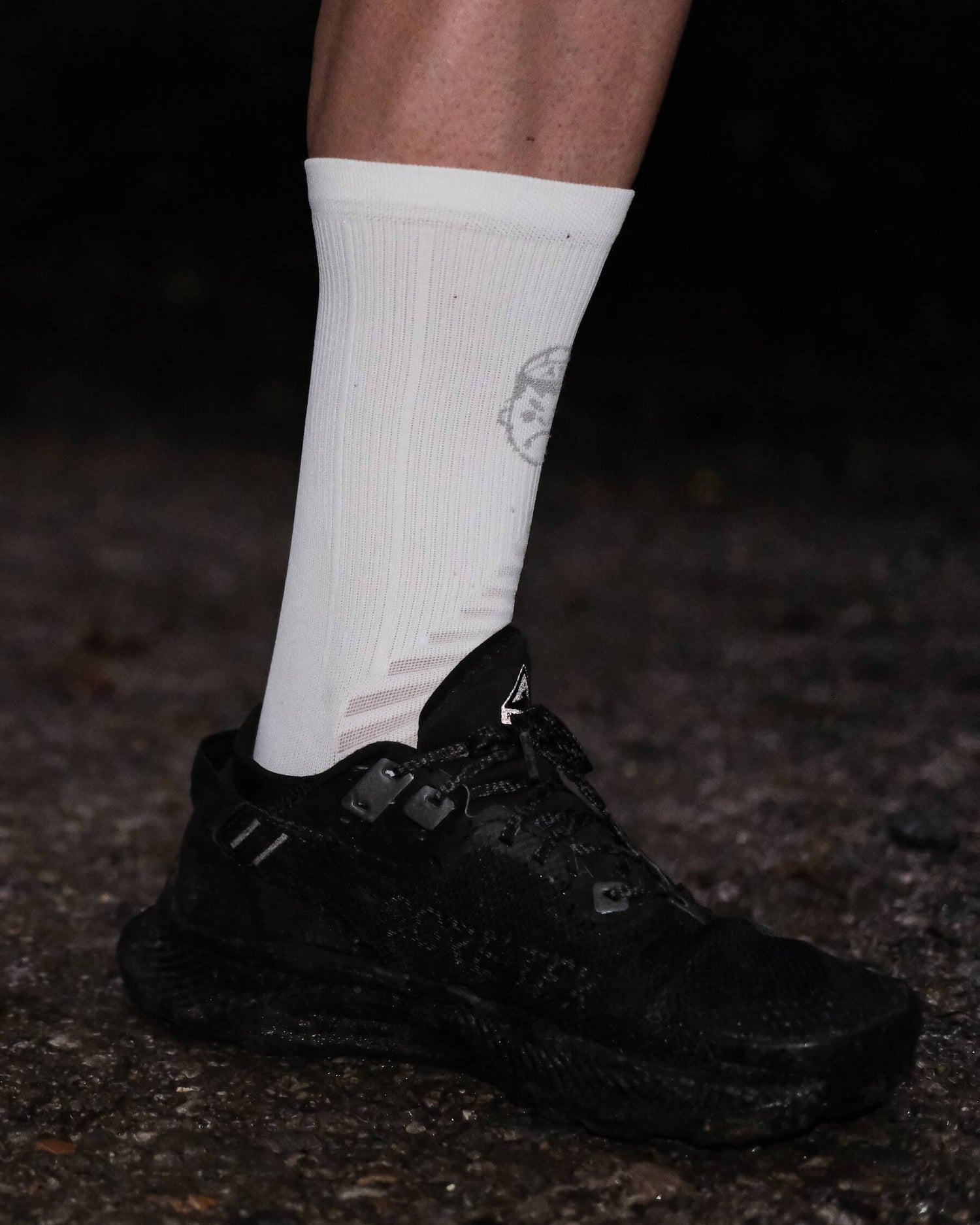 The front of a pair of white running socks